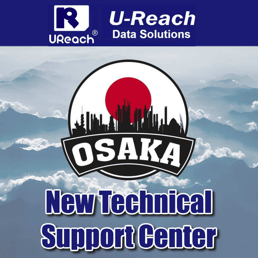 Logo for U-Reach Data Solutions above an Osaka city emblem with a red sun and black skyline, set against clouds and mountains. Text reads: New Technical Support Center at the Osaka Branch Office.